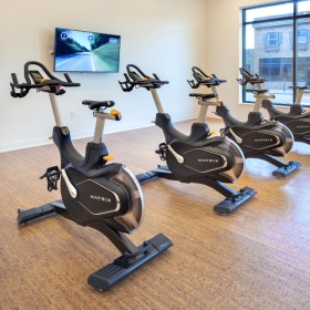 Get your workout on a room with exercise equipment